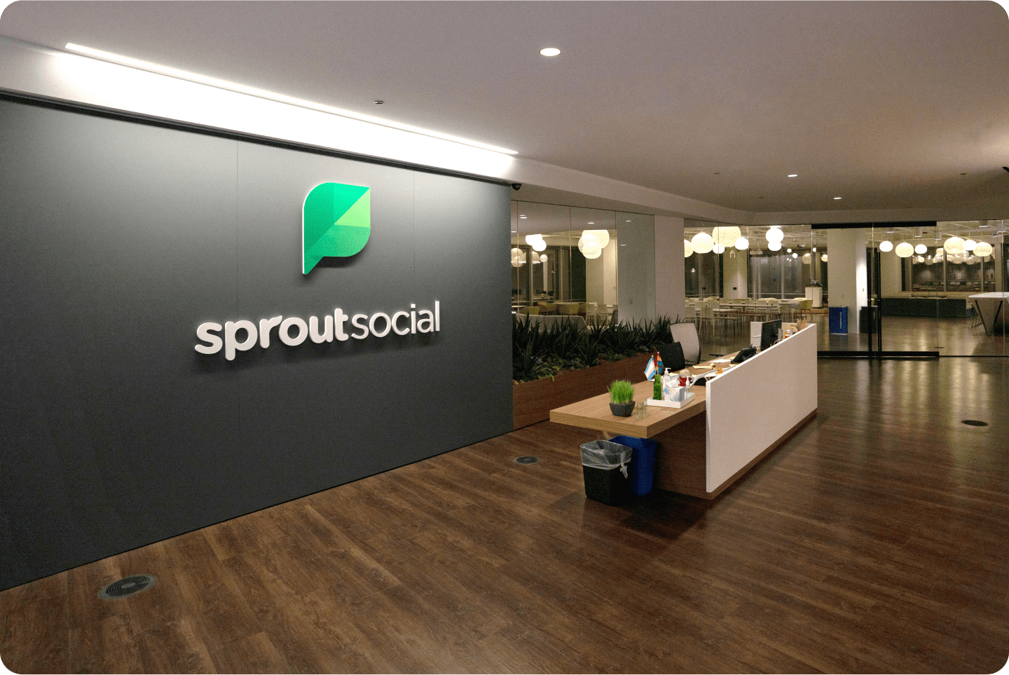 The Sprout Social logo prominently displayed on the wall behind the front desk of Sprout’s Chicago office.